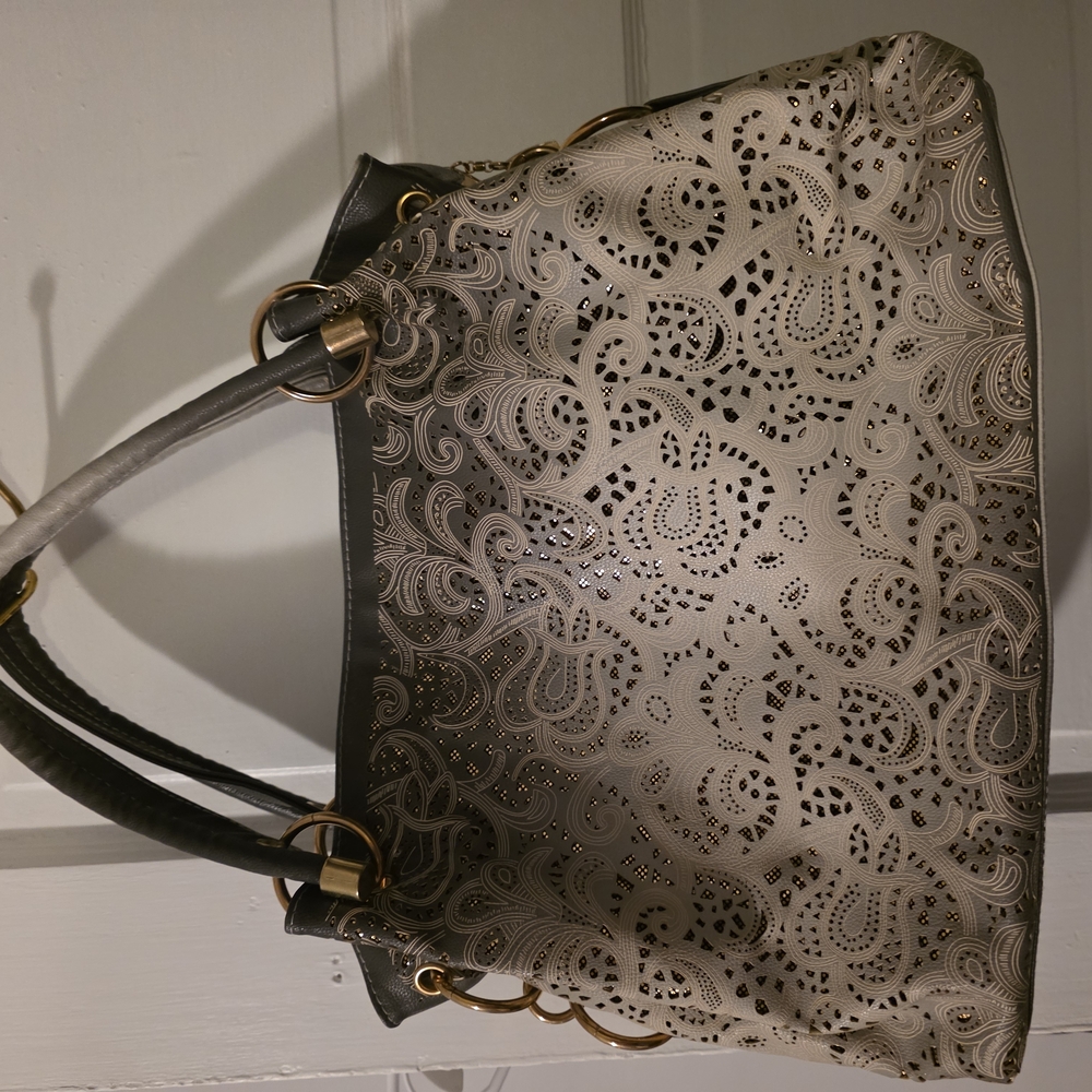 Elegant Cream and Black Shoulder Bag with Intricate Design